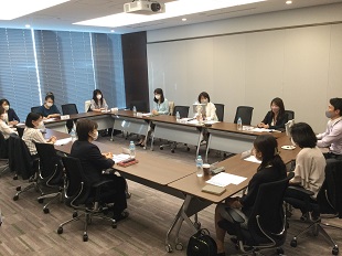 Mizuho conducts training programs to prepare female employees for managerial positions.